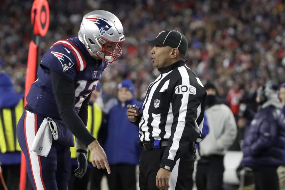 New England Patriots quarterback Tom Brady appeals to down judge Patrick Holt that wide receiver N'Keal Harry had scored a touchdown in the second half of an NFL football game against the Kansas City Chiefs on Sunday in Foxborough. Harry was ruled out of bounds before he crossed the goal line. (Elise Amendola/AP)