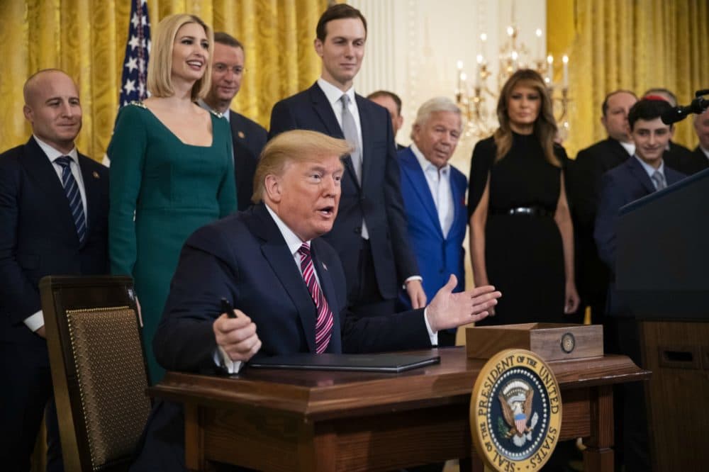 President Trump gestures before signing an executive order that will broaden Title VI of the 1964 Civil Rights Act to apply to discrimination based on anti-Semitism. (Manuel Balce Ceneta/AP)