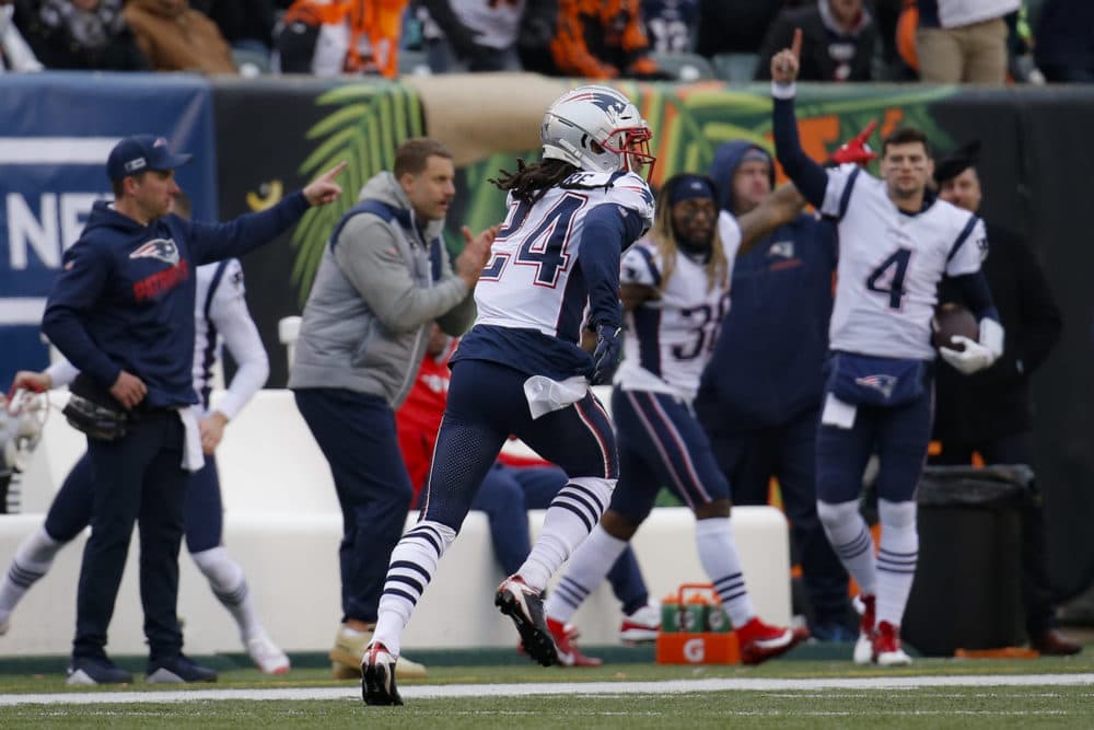 New England Patriots cornerback Stephon Gilmore (24) runs in a touchdown off an interception in the second half of an NFL football game against the Cincinnati Bengals, Sunday, Dec. 15, 2019, in Cincinnati. (AP Photo/Frank Victores)