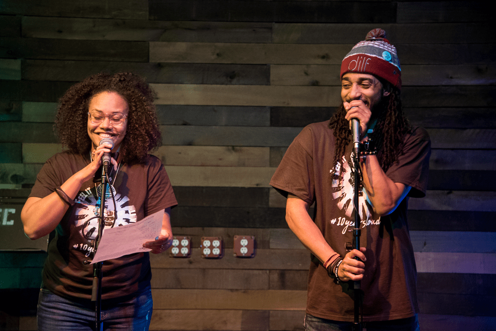 Jha D and D.Ruff introduce the ground rules for the If You Can Feel It, You Can Speak It open mic at its 10th anniversary celebration. (Courtesy Bryan Trench/The Event Shooters)