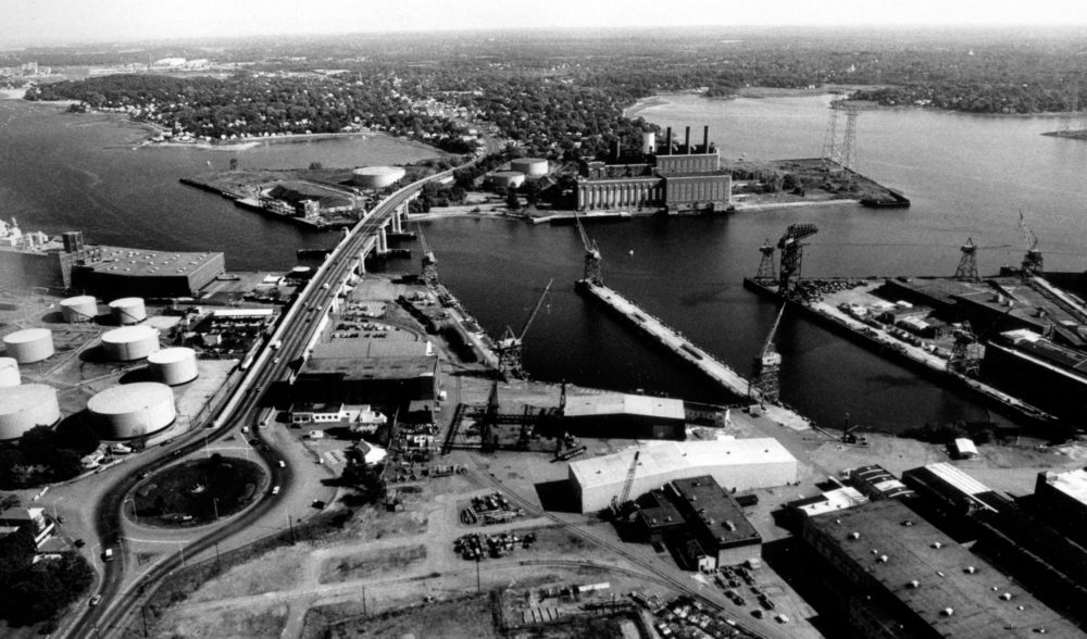 In this 1987 photo, you can see the 11.2 million gallon tank and a pile of coal on the north parcel (top left).