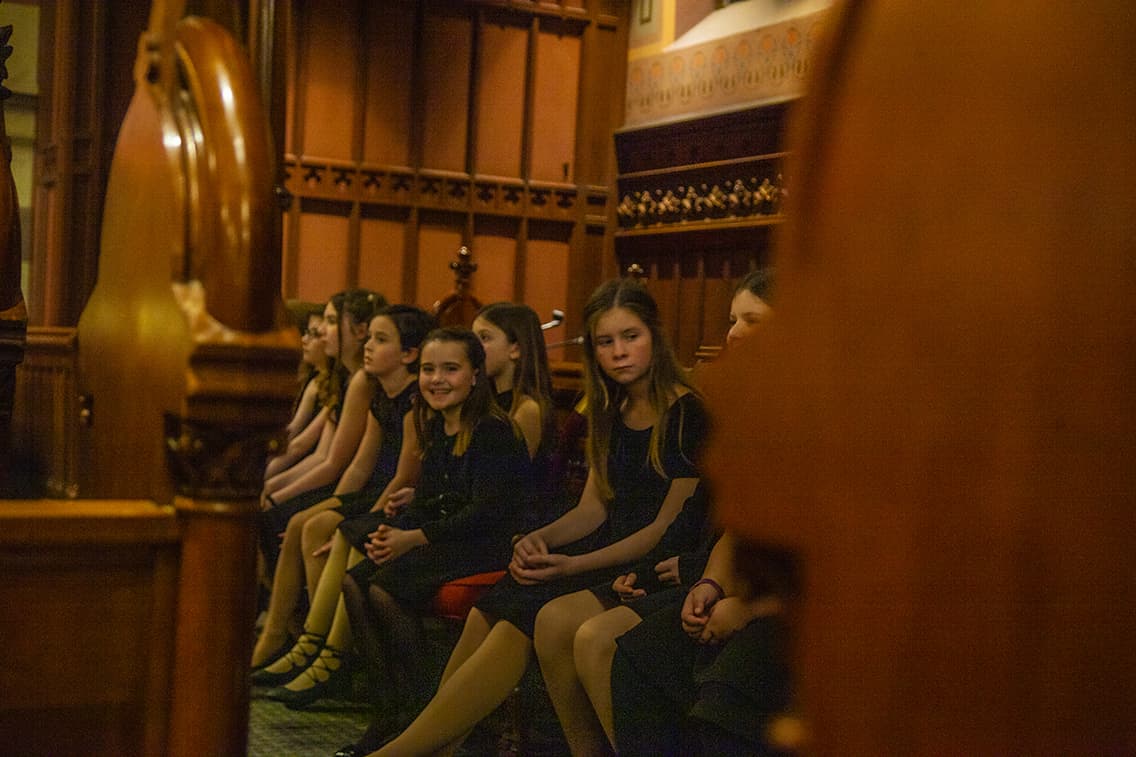 Young singers wait their turn at the Old South Church (OJ Slaughter for WBUR)
