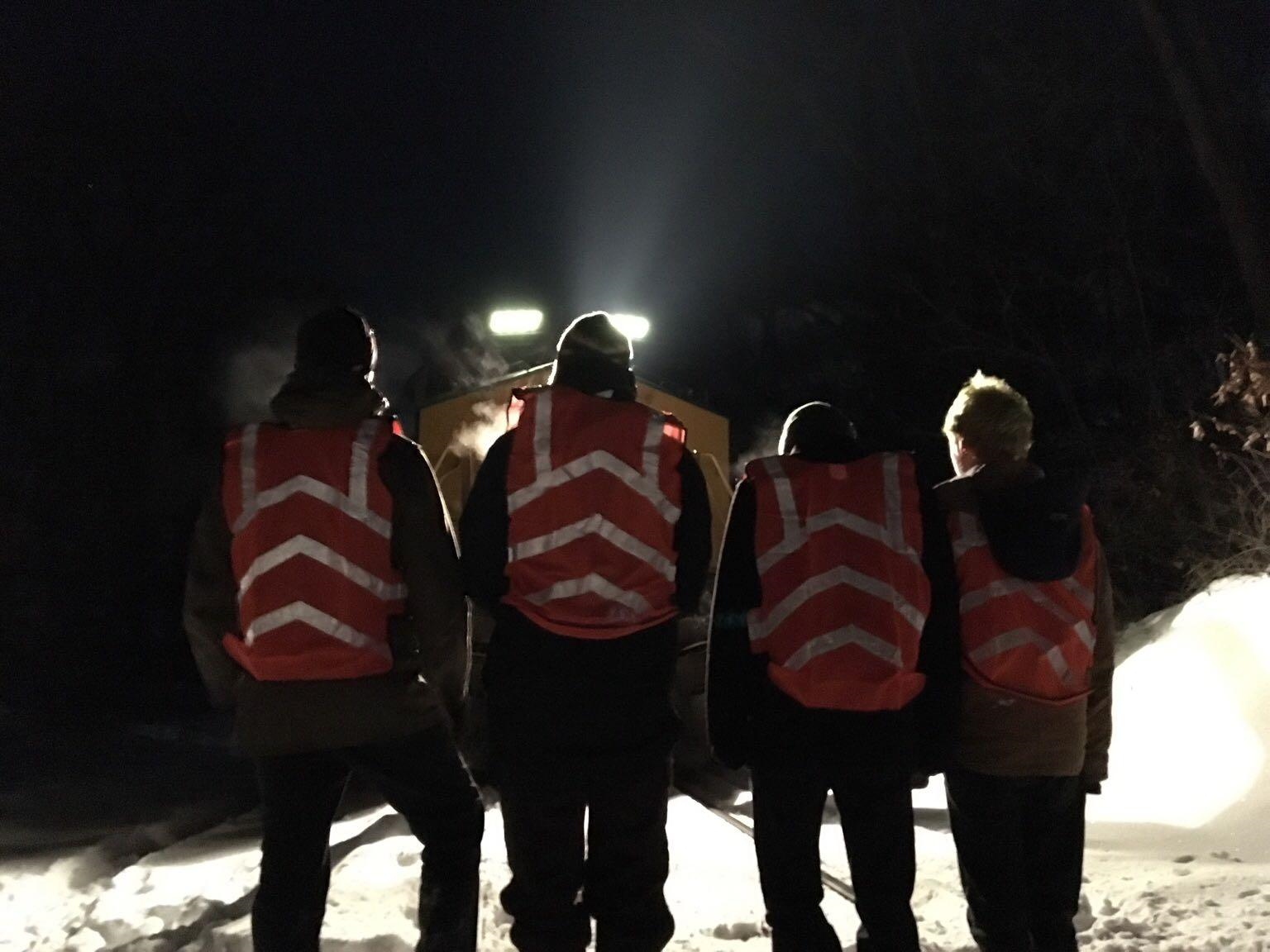 Protesters flagged down the coal train to stop it and then occupied the tracks in Massachusetts early Sunday. (Courtesy of 350 New Hampshire Action)