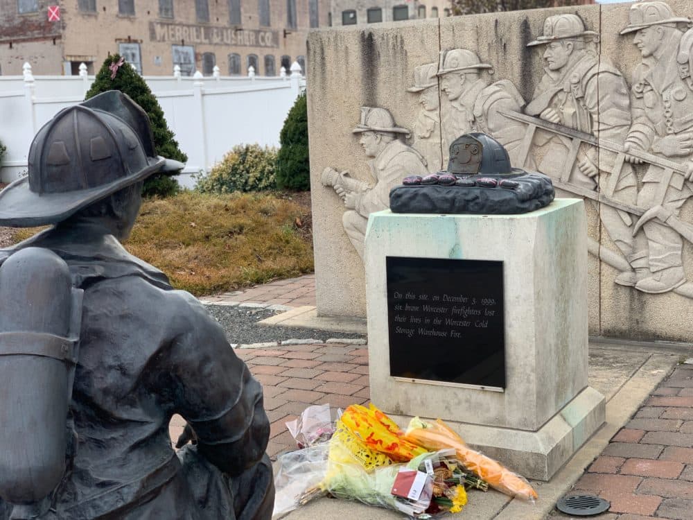 The monument dedicated to the Worcester SIx now stands at the site of the Worcester Cold Storage &amp; Warehouse Co. building. The land is now home to a fire station. (Simón Rios/WBUR)
