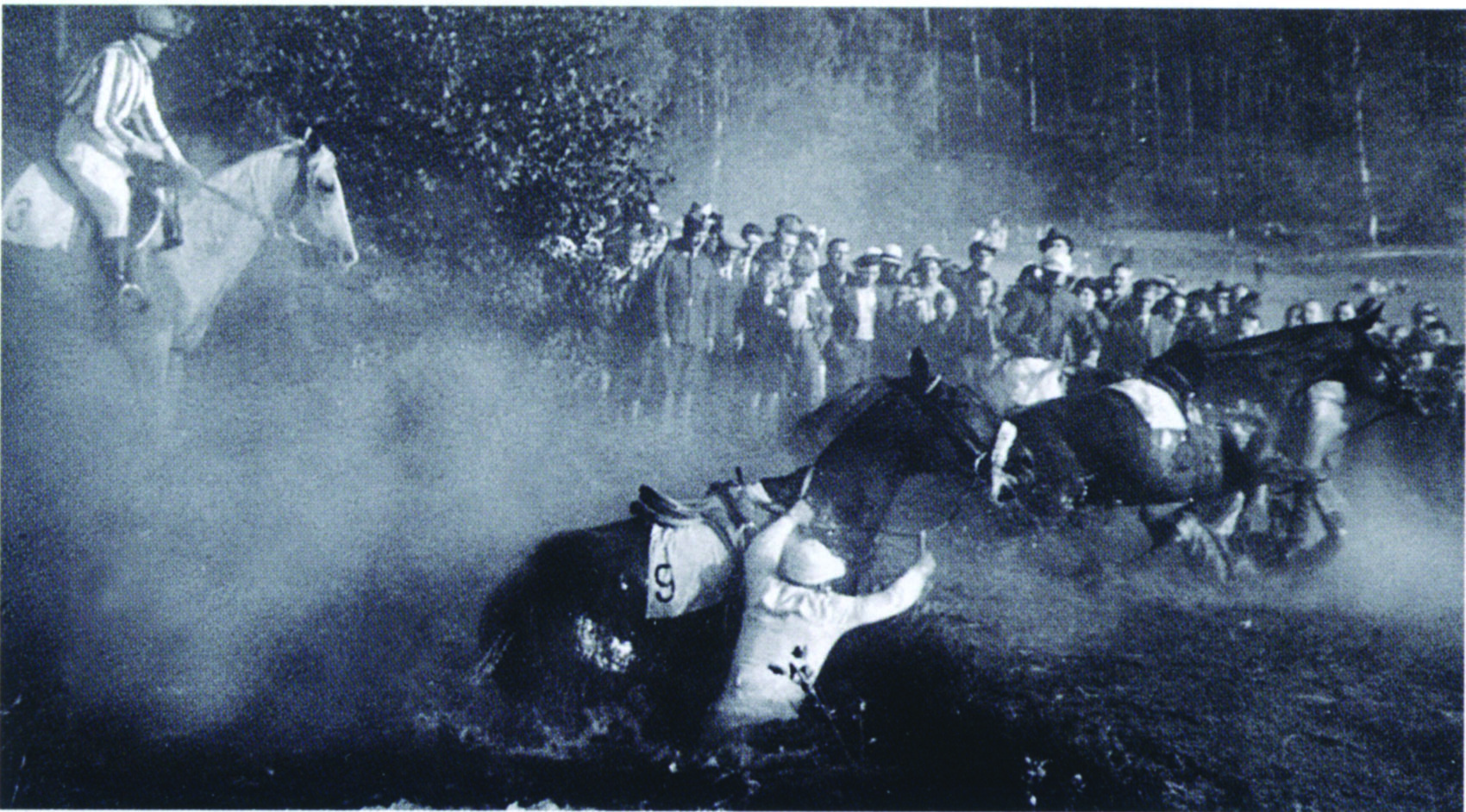 Lata and Norma (far left) at the water jump in the 1934 Velká Pardubická. (Courtesy of Vychodočesk Muzeum, Pardubice)