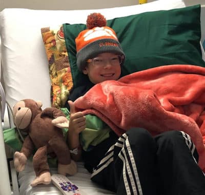 Aaron was thumbs up a couple weeks after he got his new kidney. So was Curious George. (Courtesy Aaron's Army)