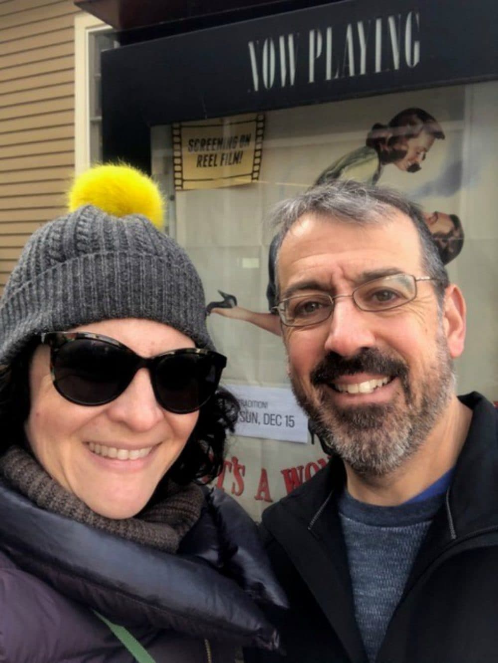 The author and her husband, Rob, in front of the Brattle Theater in December 2019,, before attending a screening of "It's A Wonderful Life." (Courtesy)