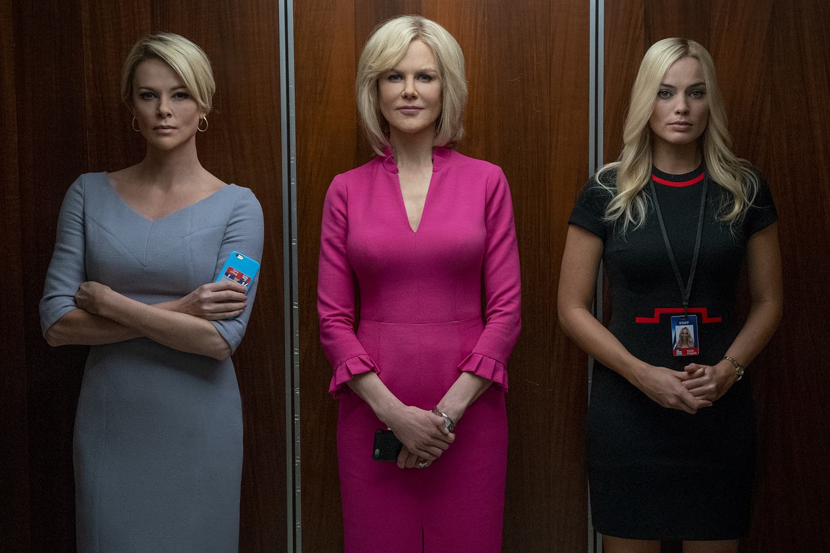 Charlize Theron (left) as Megyn Kelly, Nicole Kidman (center) as Gretchen Carlson and Margot Robbie as fictional Fox News producer Kayla Pospisil in "Bombshell." (Hilary Bronwyn Gayle SMPSP)