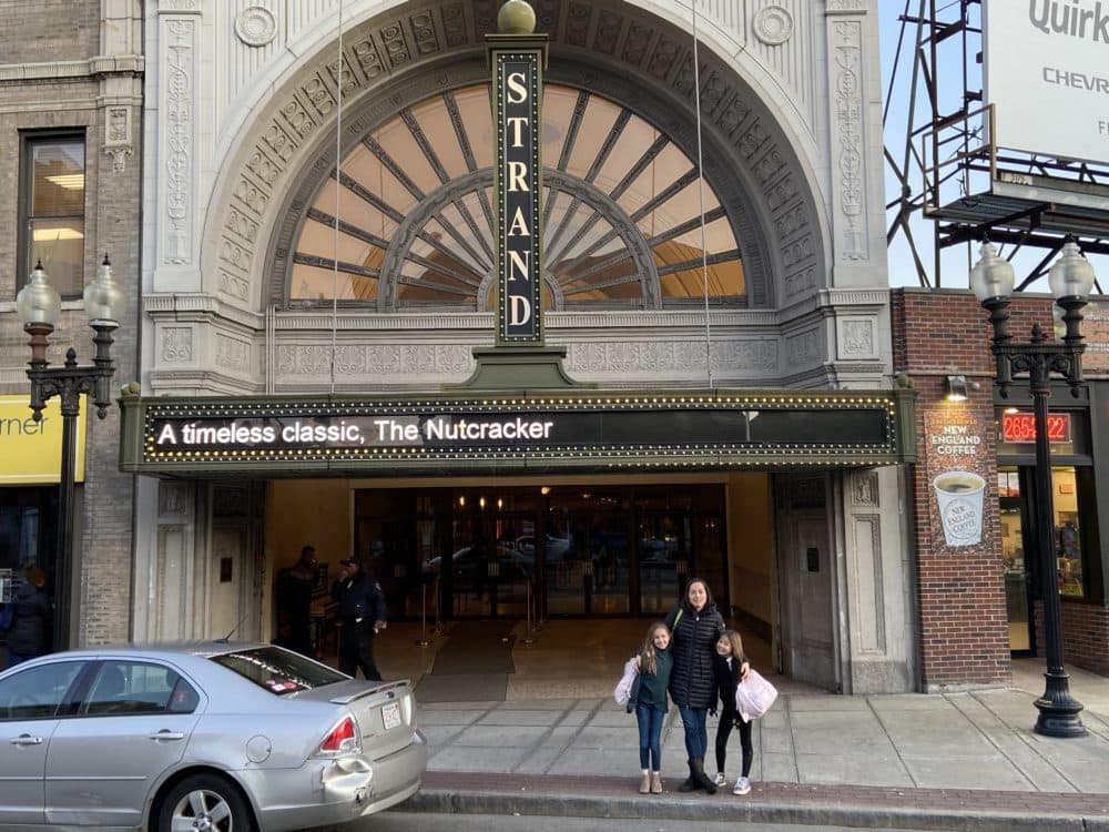 The author and her daughters Summer, left, 9, and Harper, 7, outside the Strand Theatre in Dorchester, Mass., before one of the girls’ performances, Dec. 15, 2019. (Courtesy)