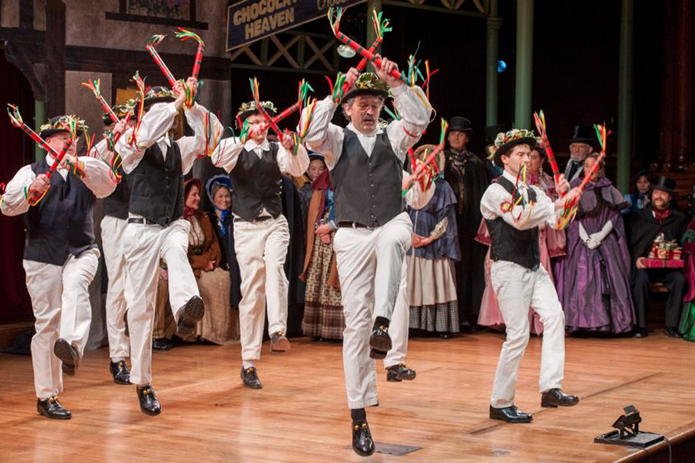 The Pinewoods Morris Men team dancing during a Revels performance. (Courtesy Revels)