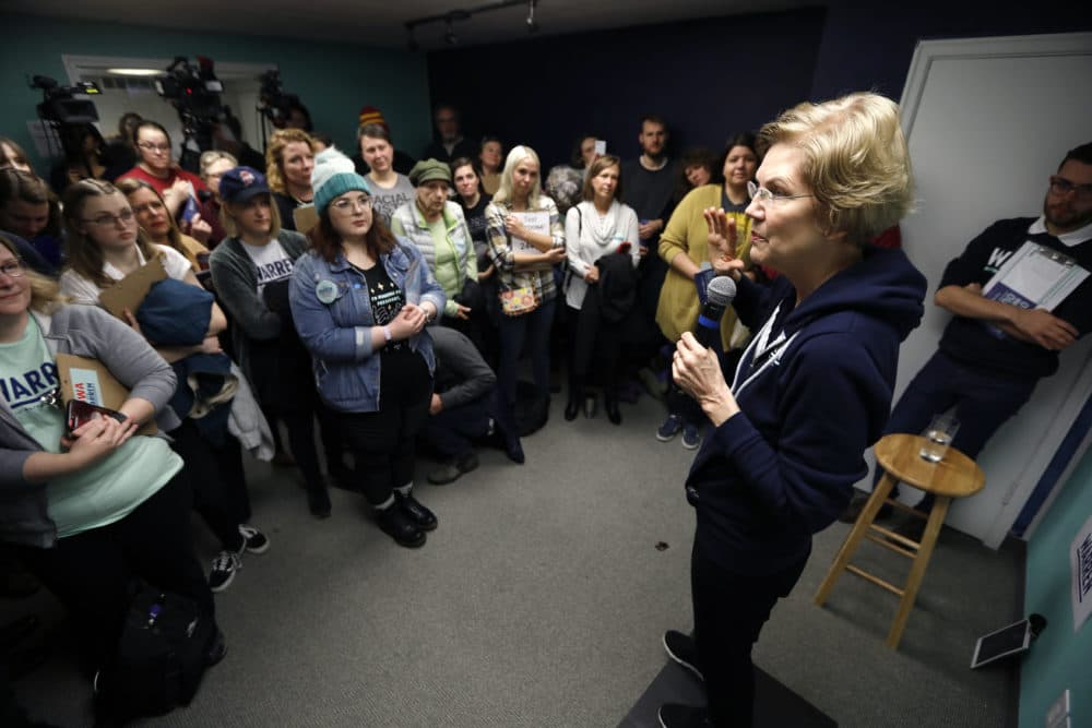 Democratic presidential candidate Sen. Elizabeth Warren, D-Mass., speaks to volunteers during a stop at her campaign headquarters on Saturday in Des Moines, Iowa. (Charlie Neibergall/AP)
