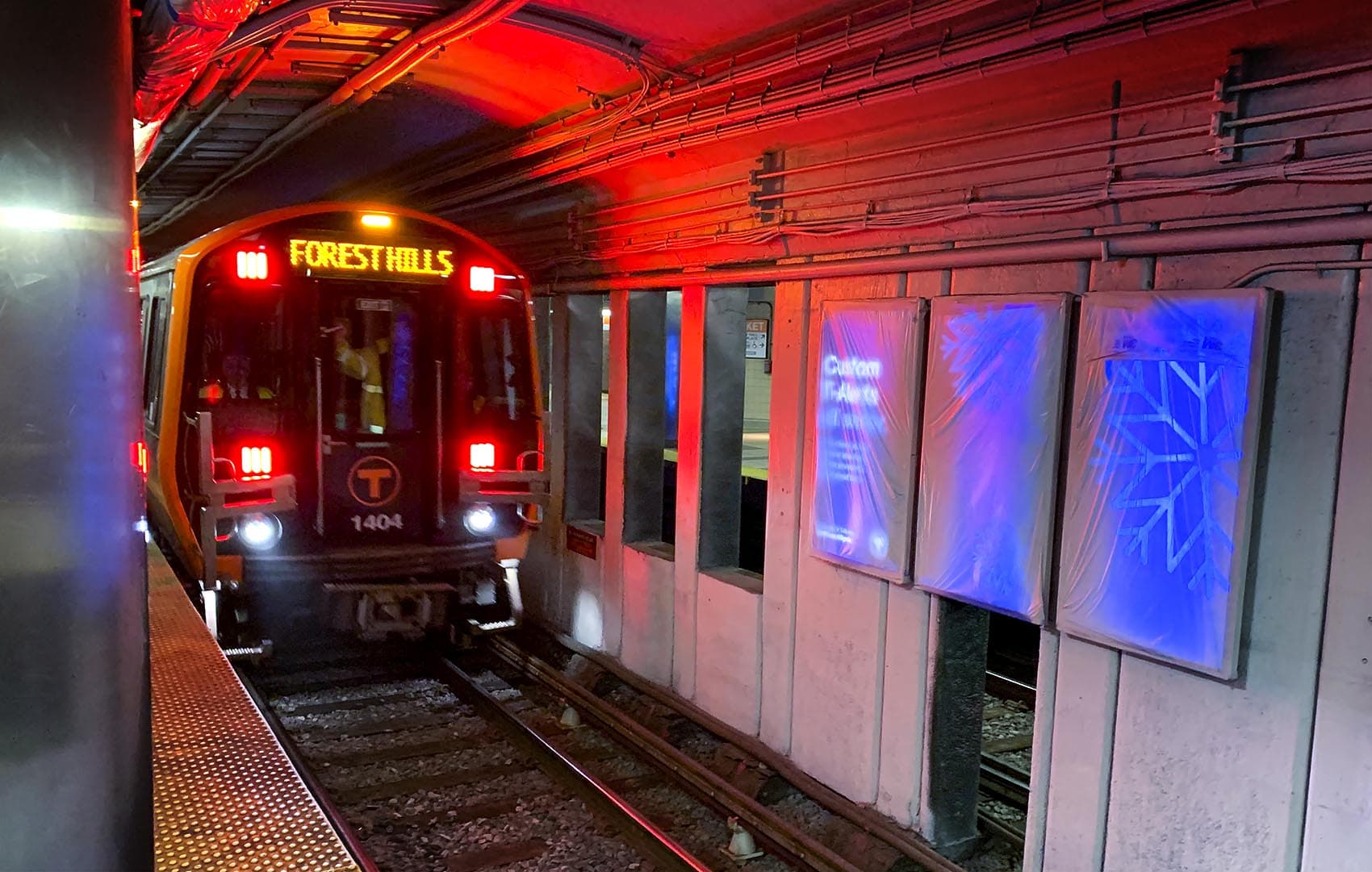 One of the new Orange Line MBTA cars on the track. (Steve Brown/WBUR)