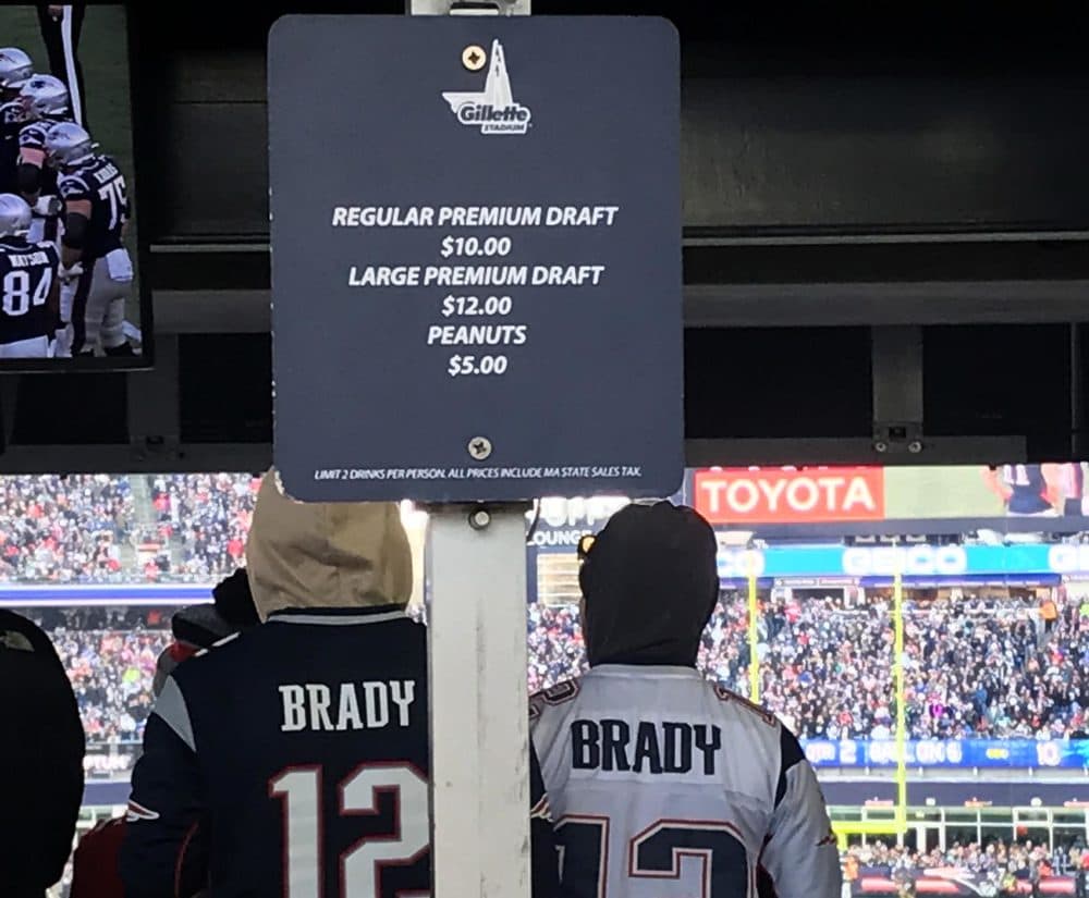 Want a beer when you attend a game at Gillette Stadium? It'll cost you at least $10 for a draft. (Shira Springer/WBUR)
