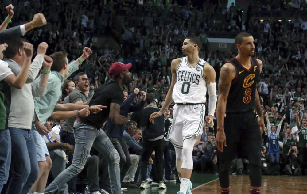Boston Celtics forward Jayson Tatum celebrates with fans during the second half of Game 7 of the 2018 NBA Eastern Conference finals. (Elise Amendola/AP)