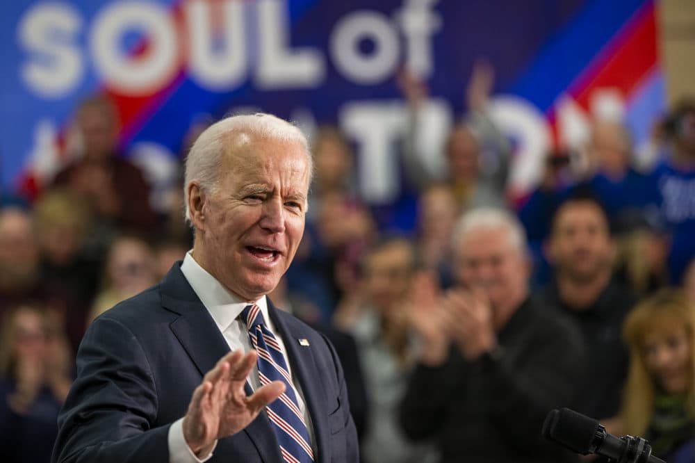 Supporters cheer as presidential candidate Joe Biden steps up to the podium before a speech at the Vince Meyer Learning Center in Waukee, Iowa, part of his “Soul of the Nation” tour. (Jesse Costa/WBUR)