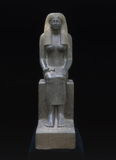 The last and largest of Kerma’s royal tumuli held a quantity of Egyptian sculpture, much of which probably came to Nubia as a result of military incursions into Egypt. It's a statue of Lady Sennuwy, the wife of an important Egyptian official originally stood either in the family tomb at Asyut or in a sanctuary in southern Egypt. (Courtesy Museum of Fine Arts, Boston)