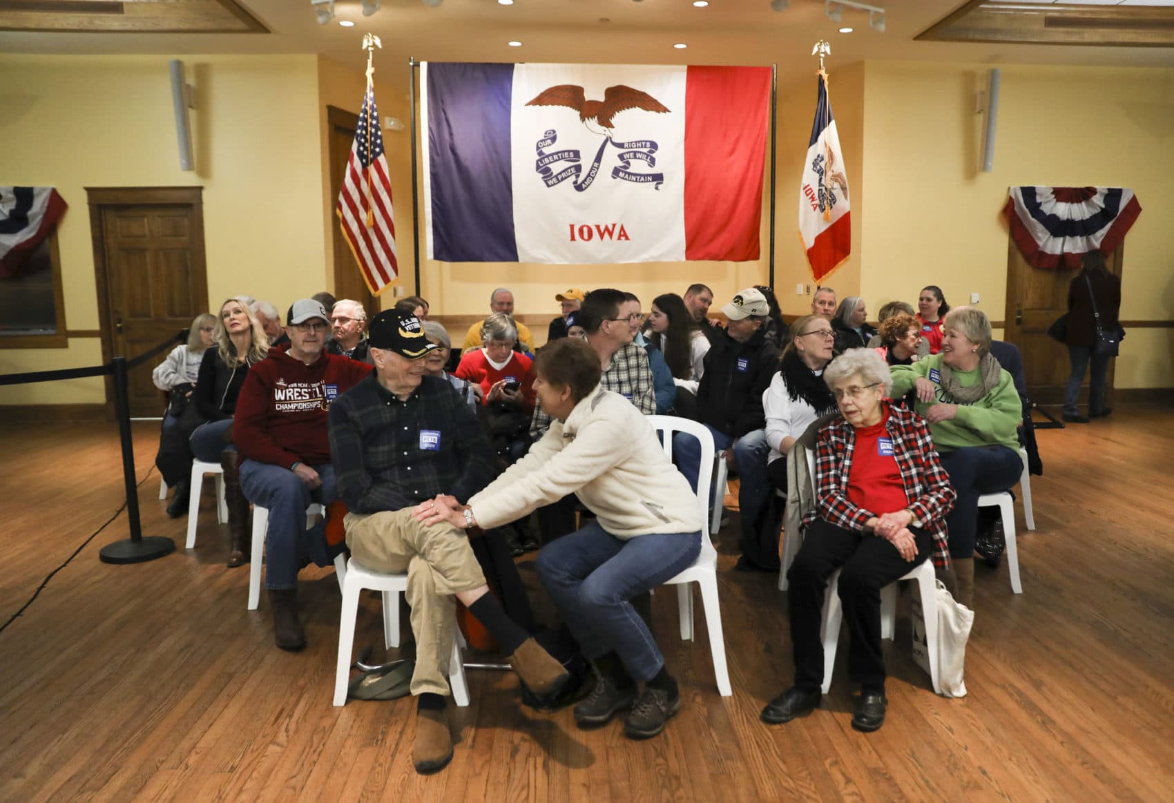 Audience members wait for speakers to begin at a campaign event for Pete Buttigieg at The Music Man Square in Mason City, Iowa, on Wednesday, Jan. 29, 2020. (Rebecca F. Miller for Here & Now)