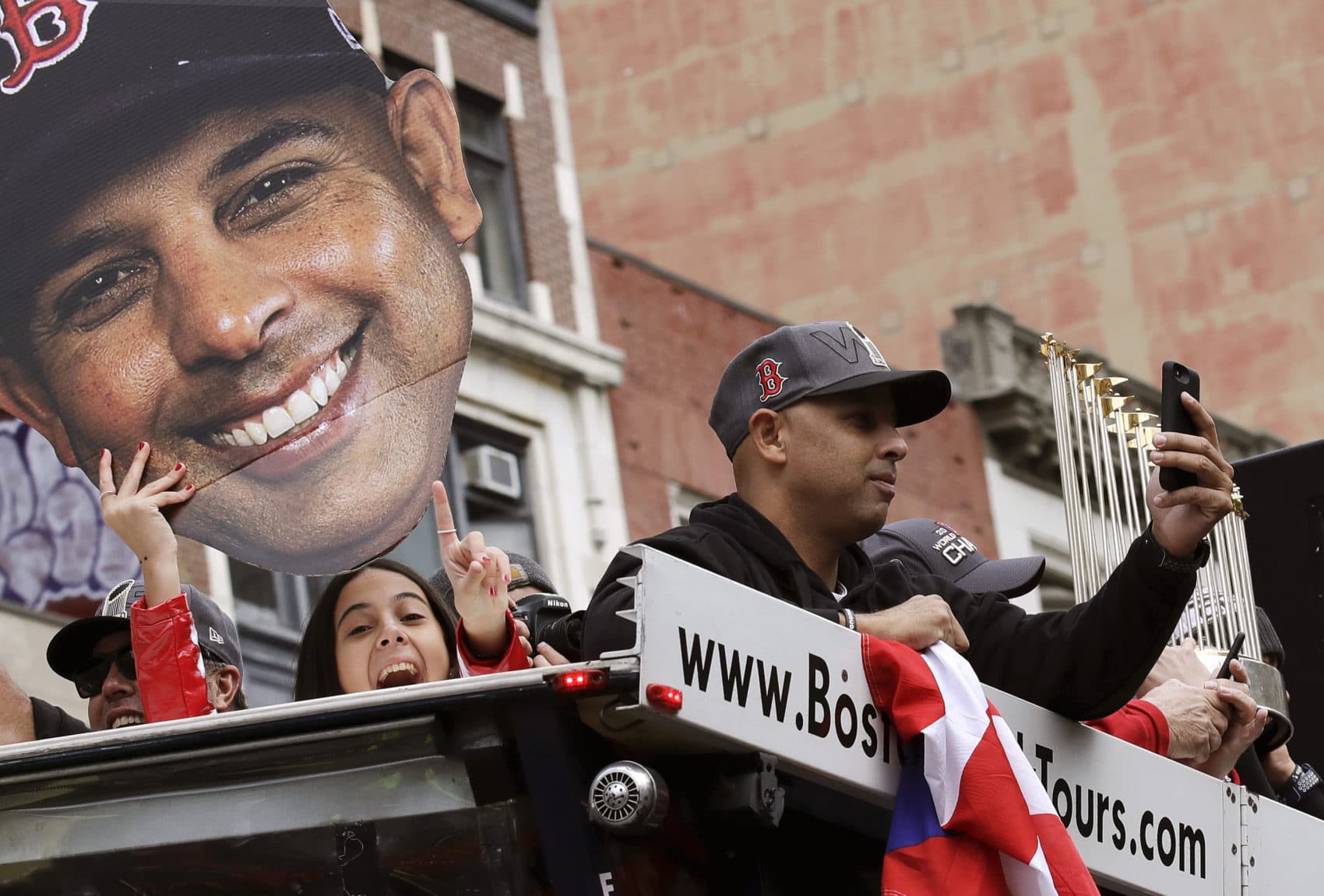 Former Red Sox manager Alex Cora celebrated the team's 2018 World Series championship at a parade in Boston in October of that year. (Charles Krupa/AP)