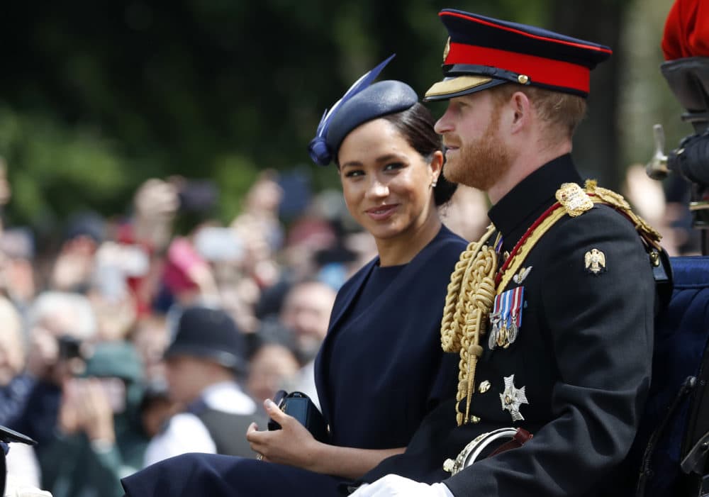 In this Saturday, June 8, 2019 file photo, Britain's Meghan, the Duchess of Sussex and Prince Harry ride in a carriage to attend the annual Trooping the Colour Ceremony in London. (Frank Augstein/AP)