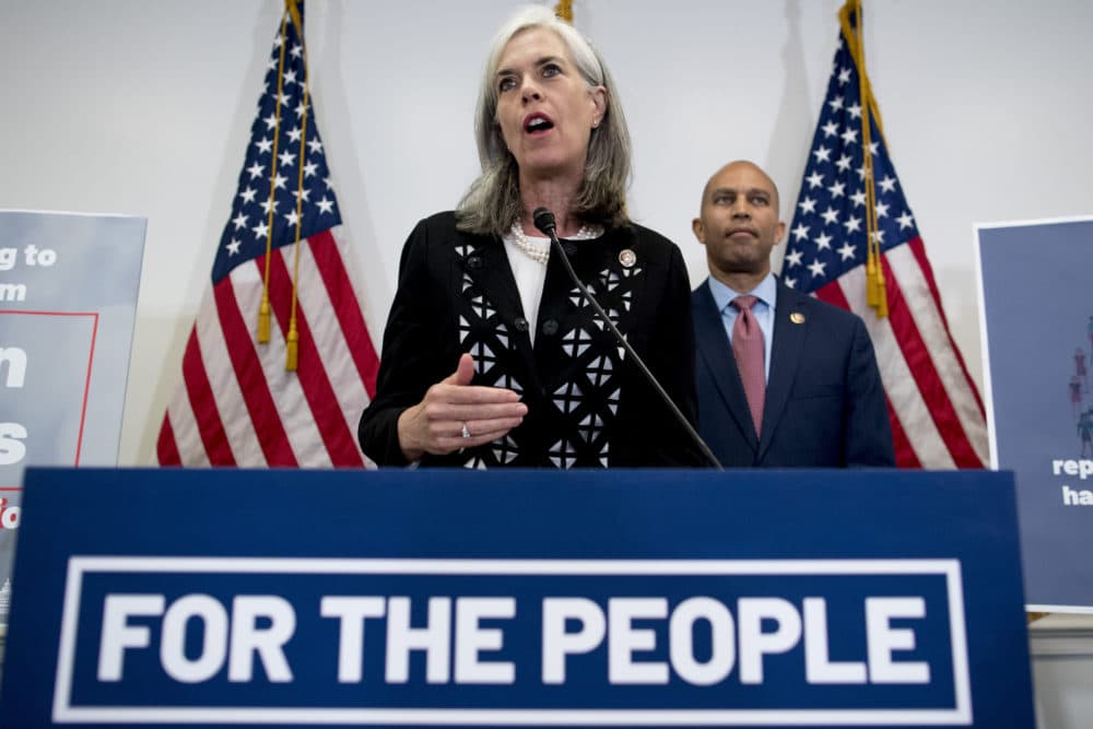 Democratic Caucus Vice Chairman Rep. Katherine Clark, D-Mass., center, accompanied Democratic Caucus Chairman Rep. Hakeem Jeffries of N.Y., right, speaks at a news conference following a House Democratic caucus meeting on Capitol Hill in Washington, Wednesday, July 10, 2019. (AP Photo/Andrew Harnik)