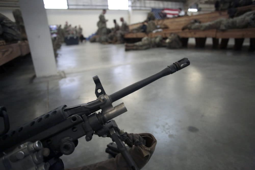 A U.S. Army soldier's weapon is ready to head out Saturday, Jan. 4, 2020 at Fort Bragg, N.C., as troops from the 82nd Airborne are deployed to the Middle East as reinforcements in the volatile aftermath of the killing of Iranian Gen. Qassem Soleimani. (Chris Seward/AP)