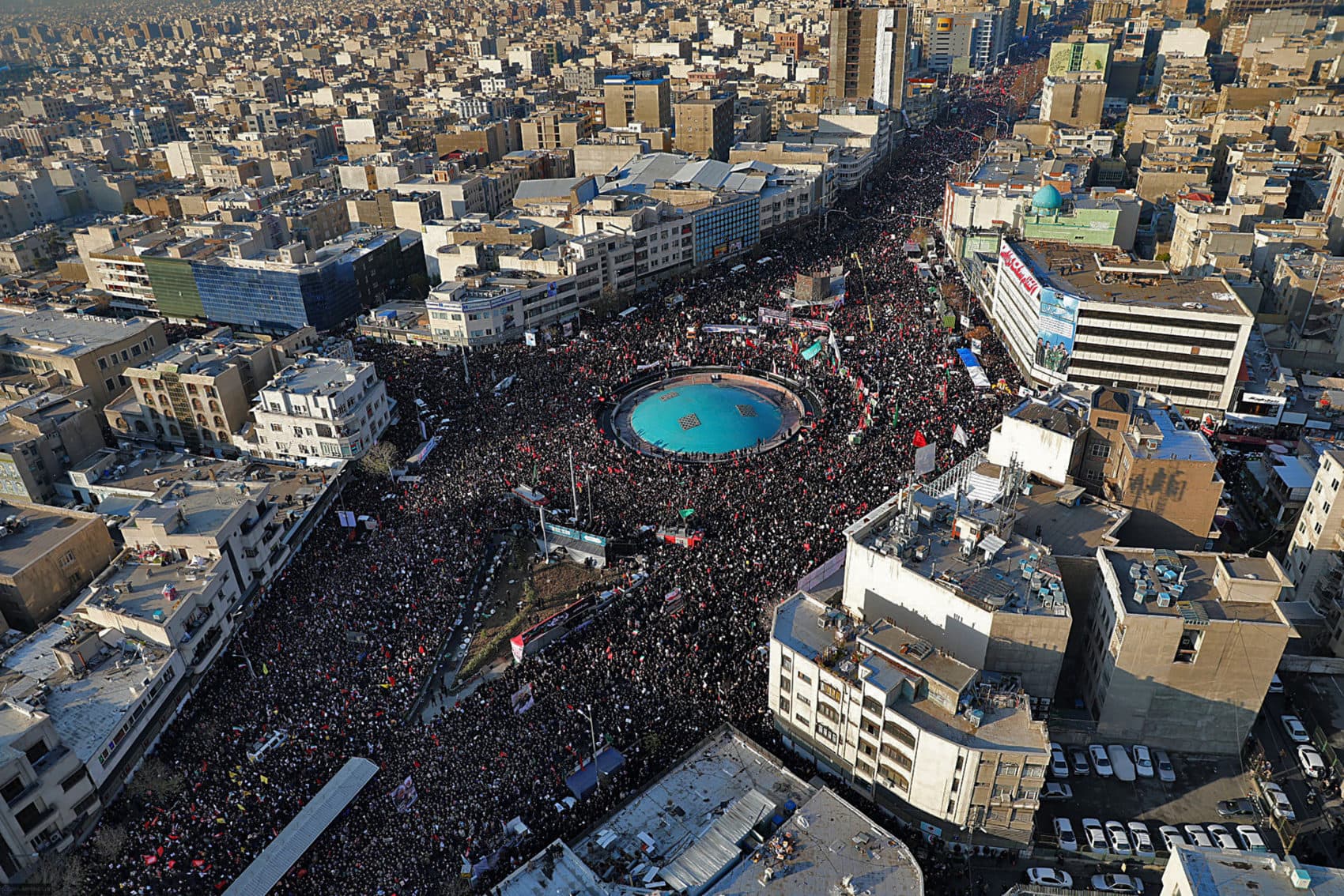 In this aerial photo released by an official website of the office of the Iranian supreme leader, mourners attend a funeral ceremony for Iranian Gen. Qassem Soleimani and his comrades, who were killed in Iraq in a U.S. drone strike on Friday, in Tehran, Iran, Monday, Jan. 6, 2020. The processions mark the first time Iran honored a single man with a multi-city ceremony. Not even Ayatollah Ruhollah Khomeini, who founded the Islamic Republic, received such a processional with his death in 1989. (Office of the Iranian Supreme Leader via AP)