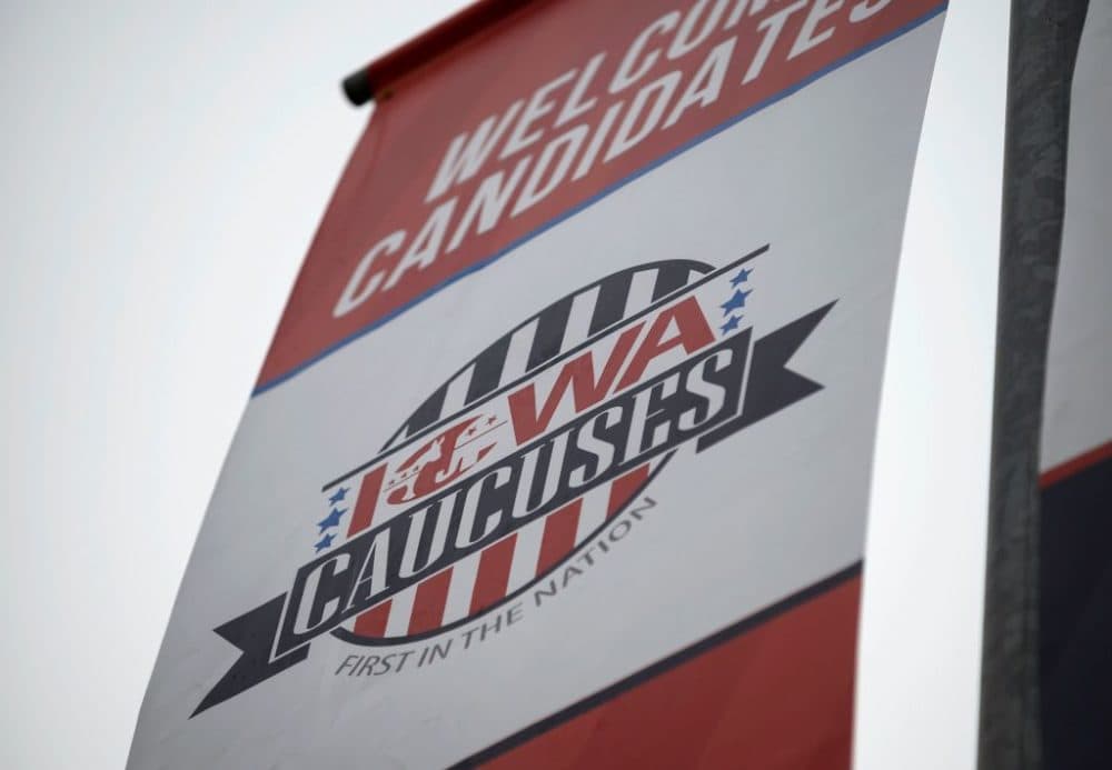 Signage for the Iowa caucuses hang in downtown Des Moines, Iowa, on January 25, 2020. (Stephen Maturen/AFP/Getty Images)