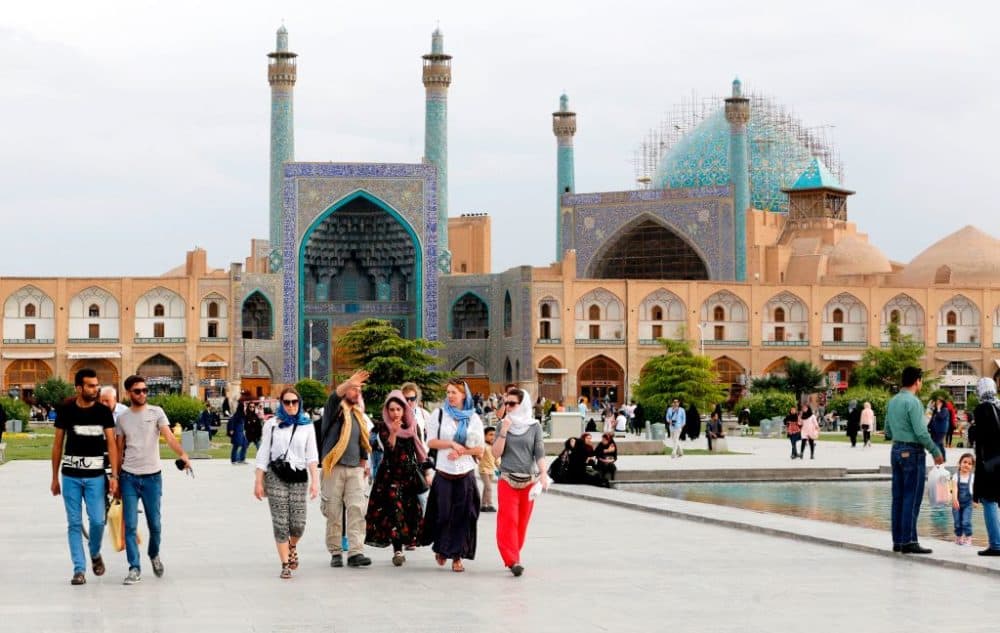 Tourists visit the historical Naqsh-e Jahan Square in Isfahan, Iran. (Atta Kenare/AFP/Getty Images)