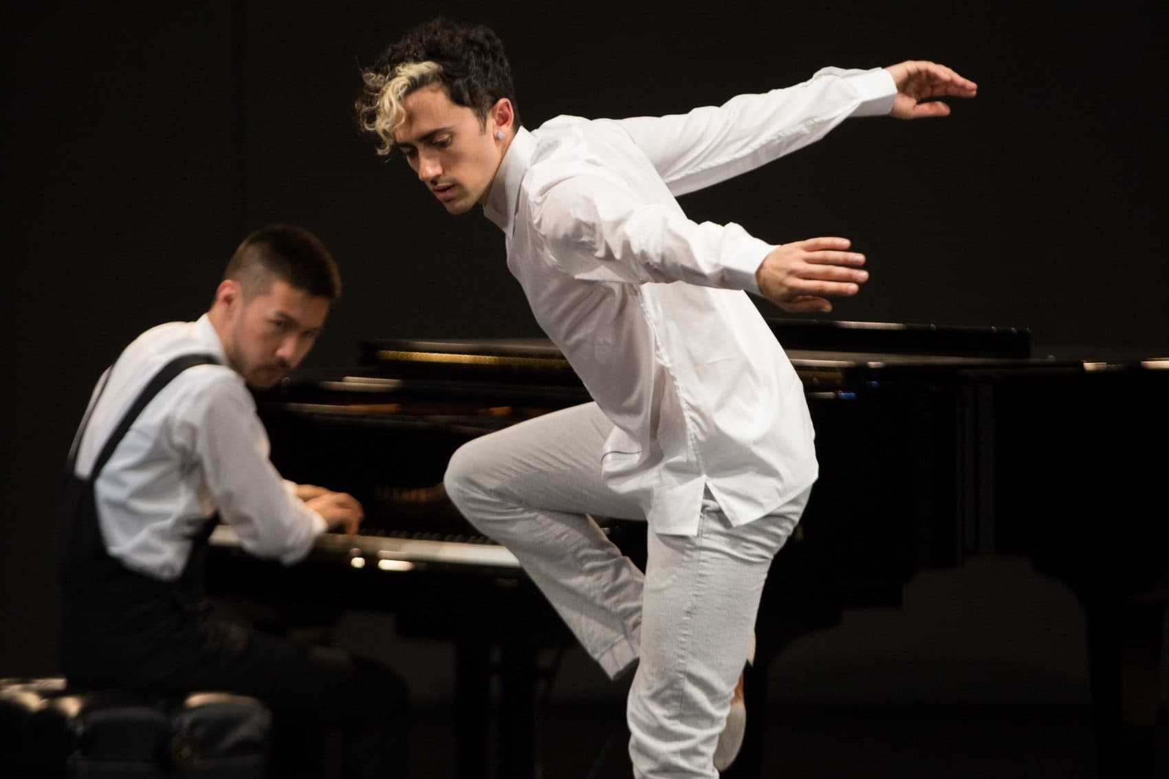 A Musician And Dancer Unite For A Novel Performance On Sand