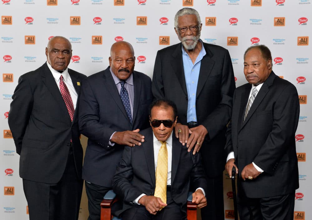 Russell poses with John Wooten, Jim Brown, Muhammad Ali, and Bobby Mitchell before the Ali Humanitarian Awards ceremony in Sept. 2014. (AP)