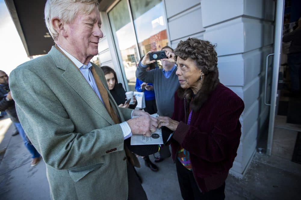 Presidential candidate and former Governor of Mass. William Weld signs an autograph during a campaign stop in Des Moines, Iowa. (Jesse Costa/WBUR)