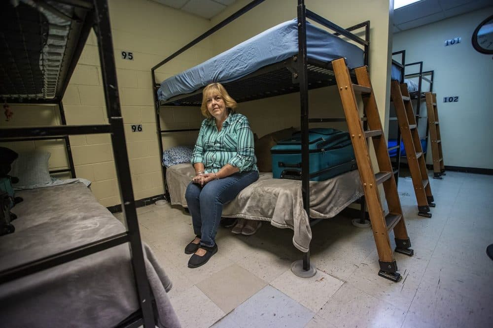 Chris Sheehan in the women's dormitory at Father Bill’s Place, which houses 24 women's beds. (Jesse Costa/WBUR)