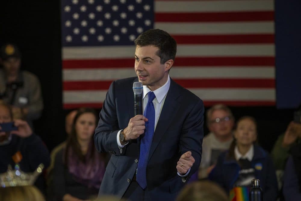 Buttigieg speaks to an audience that includes many veterans at an American Legion hall in Merrimack. (Jesse Costa/WBUR)
