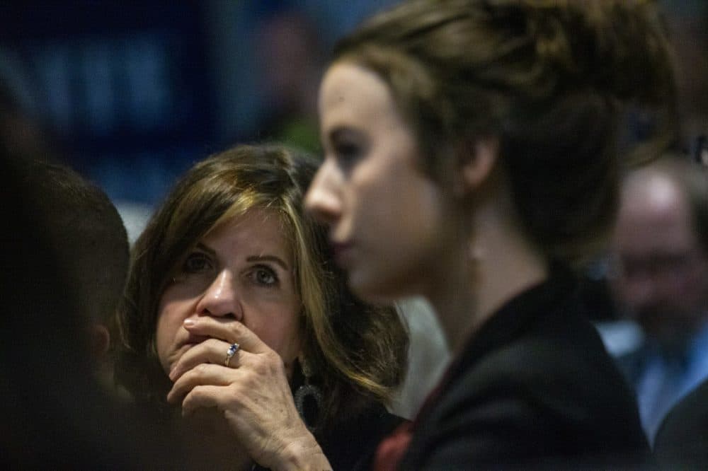 A woman listens intently Sanders during his speech at St. Anselm College in Manchester, N.H. on Feb. 7. (Jesse Costa/WBUR)