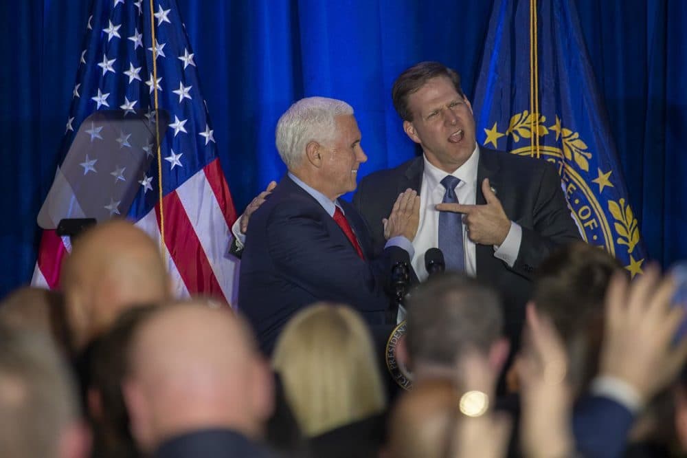 New Hampshire Gov. Chris Sununu introduces Vice President Mike Pence on the stage at the Cops For Trump event in Portsmouth, N.H. (Jesse Costa/WBUR)
