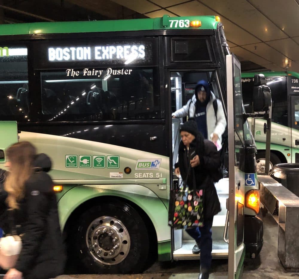 Passengers disembarking from a Peter Pan bus in Boston, Massachusetts, on Feb. 10, 2020. (Alden Bourne/NEPR)