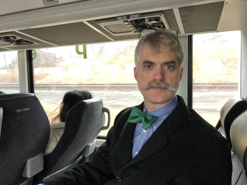 Sam Steinmann on board the Peter Pan bus from Springfield to Boston. (Alden Bourne/NEPR)