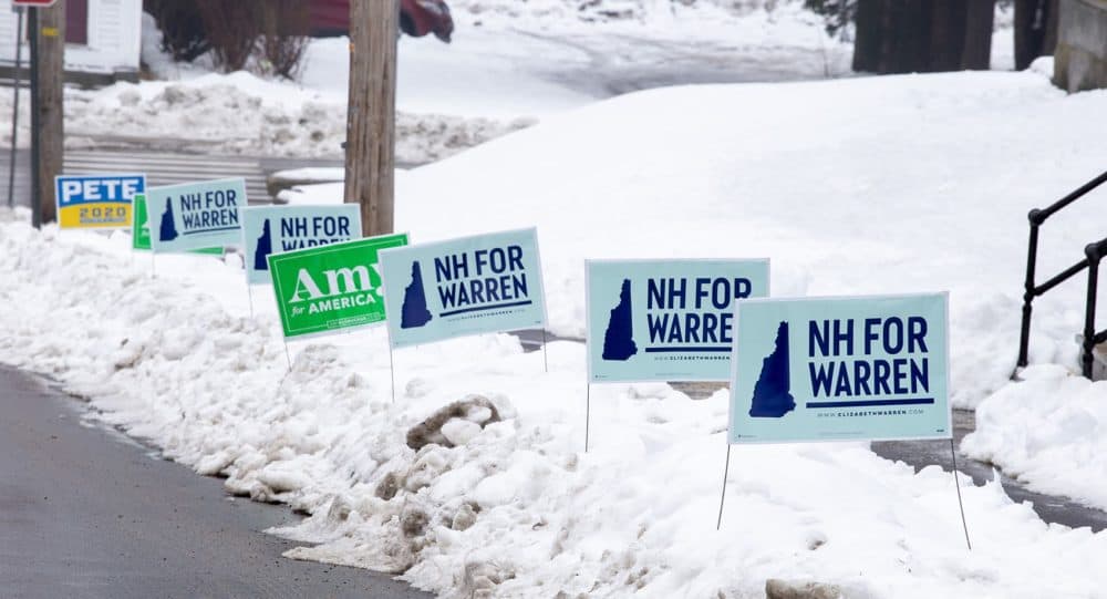 Campaign signs outside of a polling place in Concord, N.H. (Joe Difazio for WBUR)