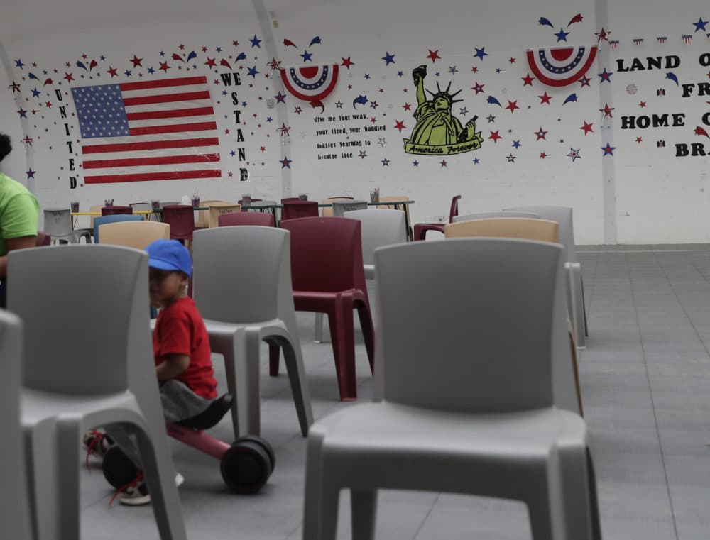 Immigrants seeking asylum watch a movie in a recreational area at the ICE South Texas Family Residential Center, Friday, Aug. 23, 2019, in Dilley, Texas. U.S. Immigration and Customs Enforcement hosted a media tour of the center that houses families who are pending disposition of their immigration cases.(Eric Gay/AP)