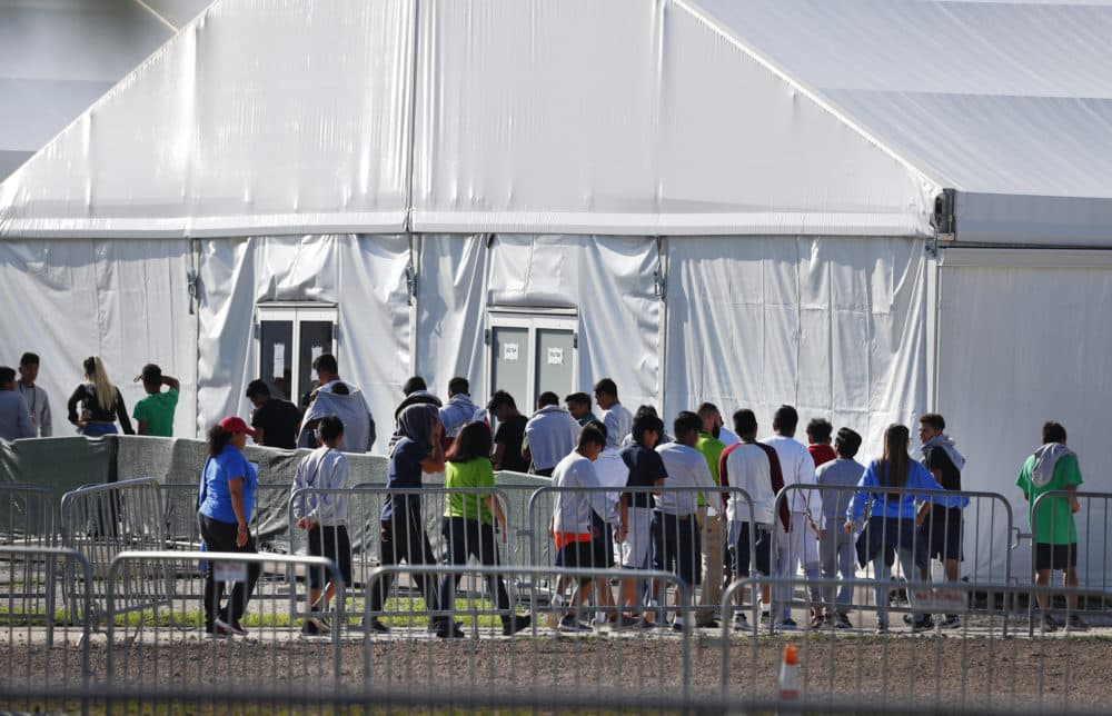 In this Feb. 19, 2019 file photo, children line up to enter a tent at the Homestead Temporary Shelter for Unaccompanied Children in Homestead, Florida. (Wilfredo Lee/AP)