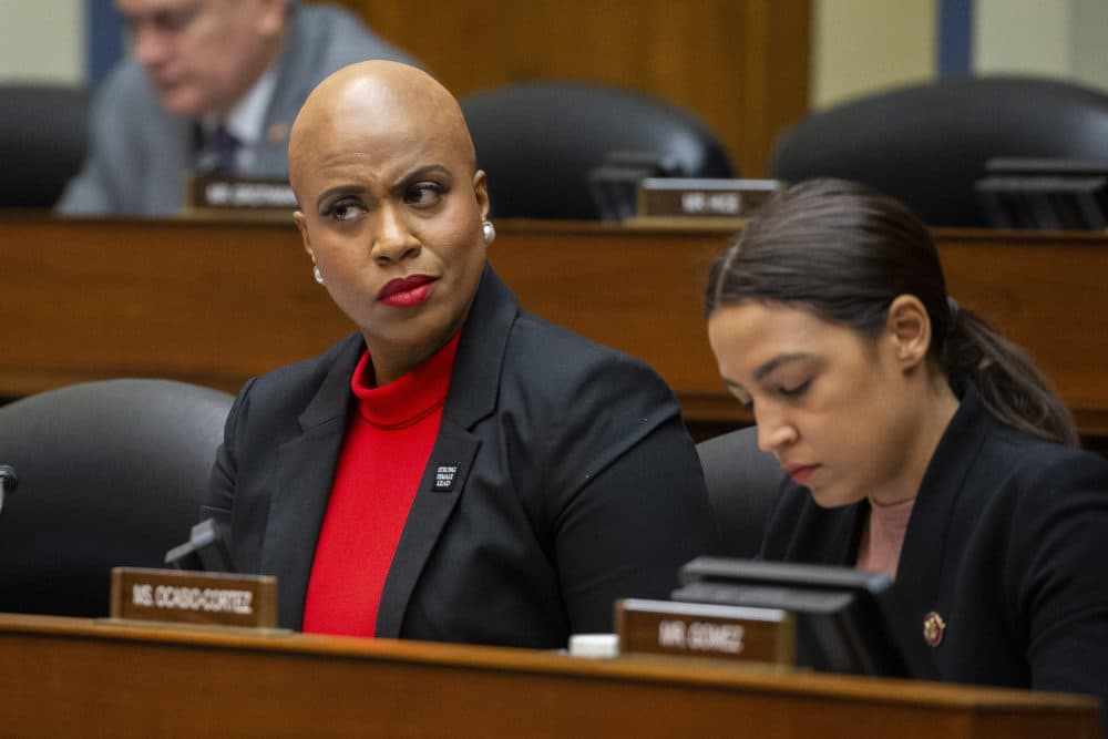 Rep. Ayanna Pressley, D-Mass., left, Rep. Alexandria Ocasio-Cortez during a hearing of the House Committee on Oversight and Reform. (Alex Brandon/AP)