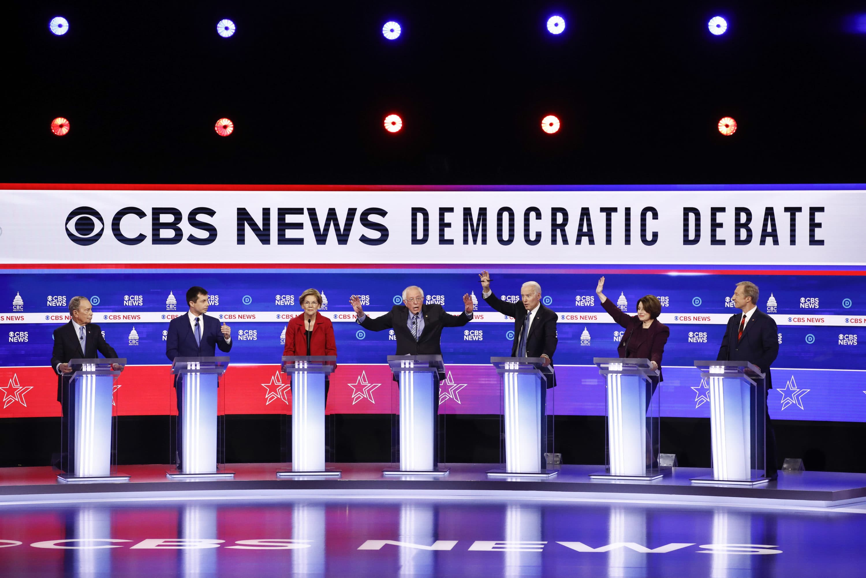 From left, Democratic presidential candidates, Mike Bloomberg, Pete Buttigieg, Elizabeth Warren, Bernie Sanders,Joe Biden, Amy Klobuchar and Tom Steyer, participate in a Democratic presidential primary debate in Charleston, S.C. (Patrick Semansky/AP)