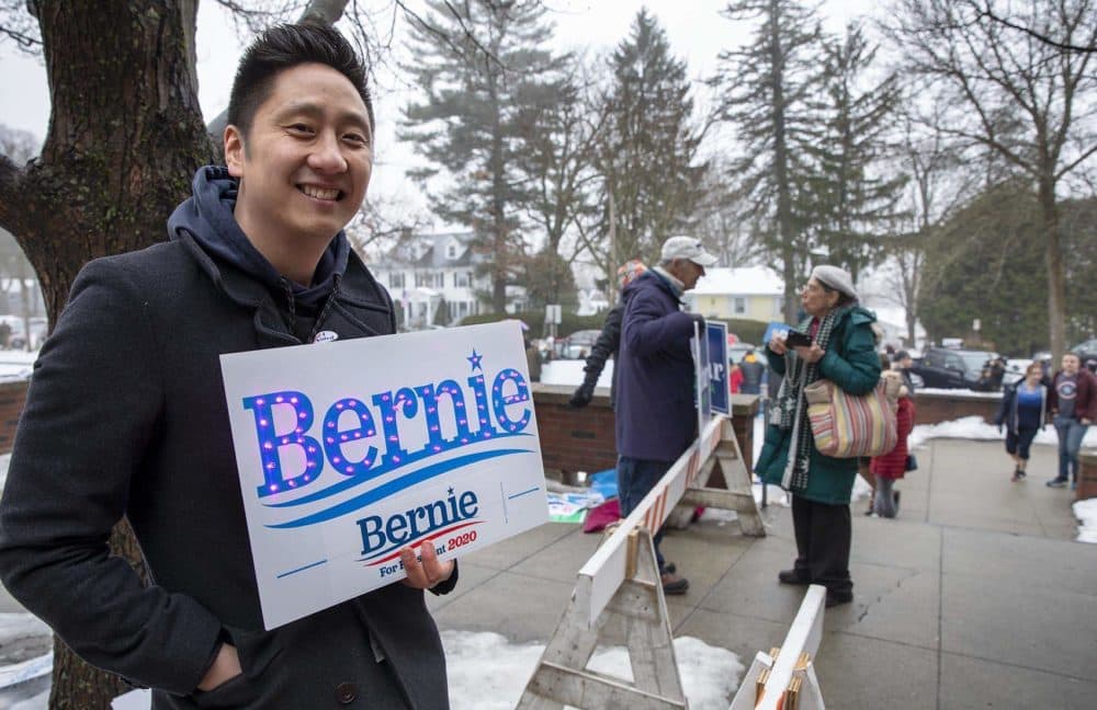 Sanders supporter Albert So has Bernie’s name in lights, outside the Webster School in Manchester, NH. (Robin Lubbock/WBUR)