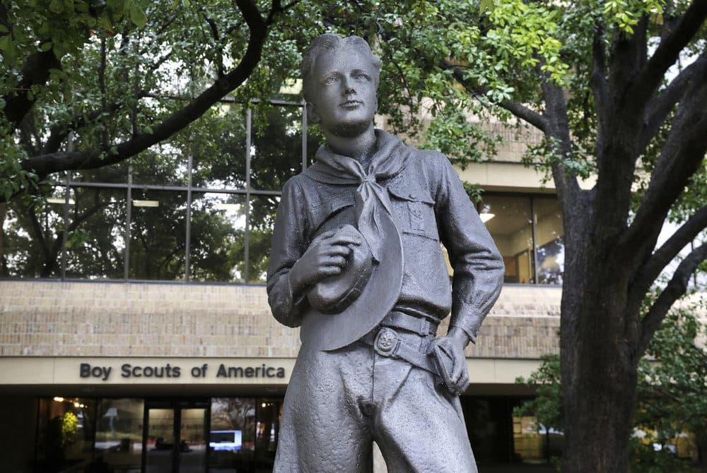 A statue stands outside the Boys Scouts of America headquarters in Irving, Texas. (AP Photo/LM Otero)