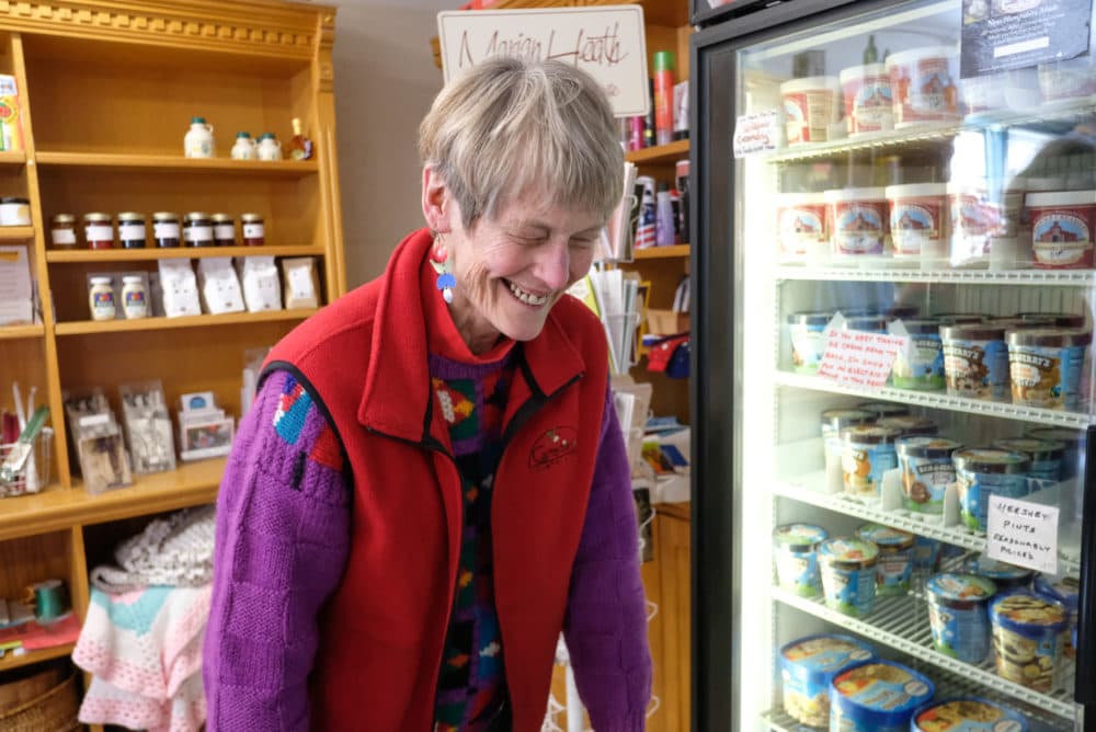 Toni Halla laughing inside the Canterbury Country Store. (Jill Ryan/Here &amp; Now)