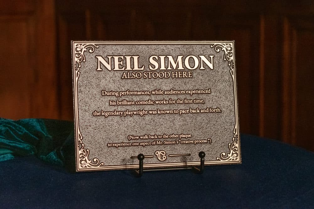 One of two plaques honoring playwright Neil Simon at the Emerson Colonial Theatre in Boston. (Allison Hagan/Here &amp; Now)