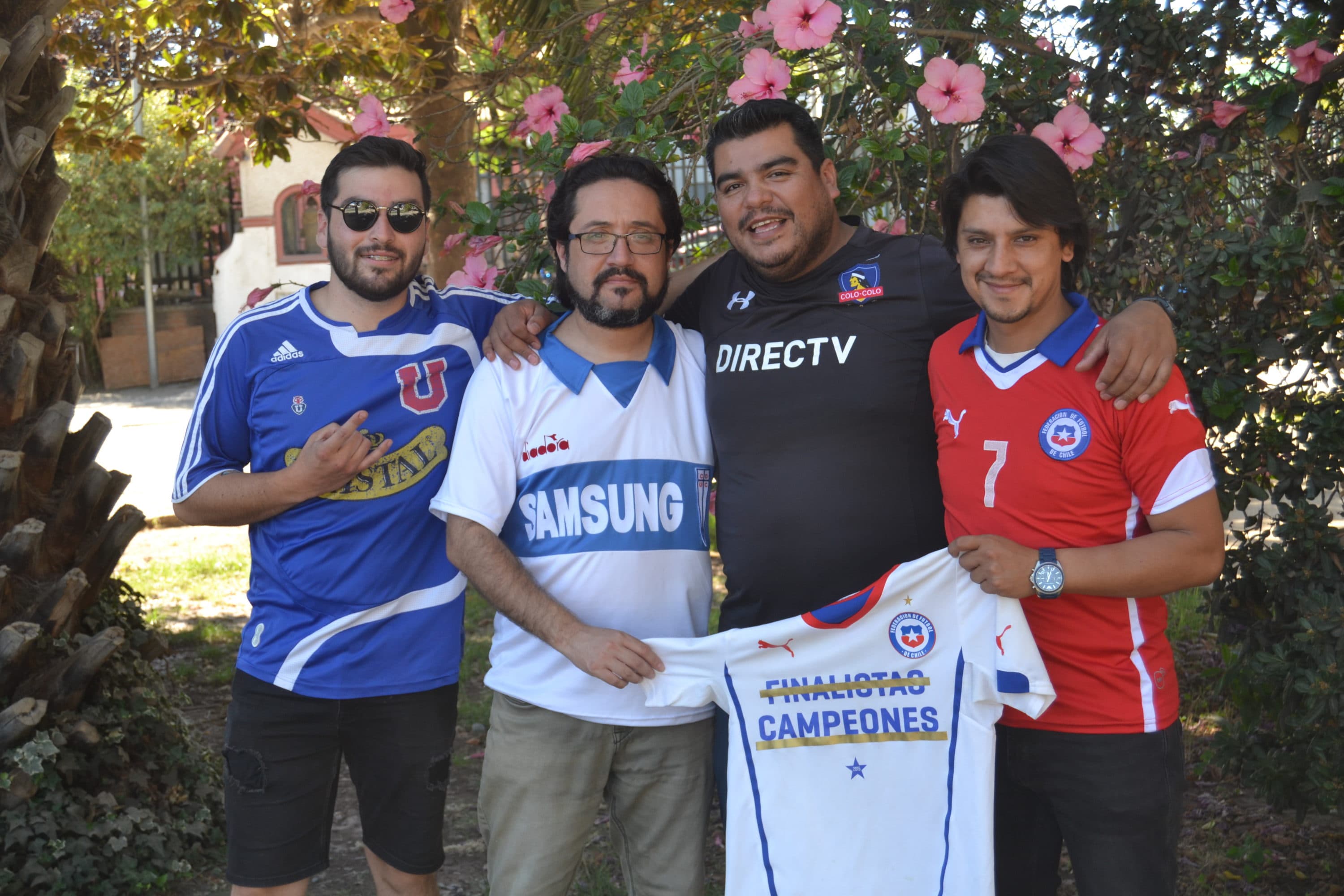 Antonino Valenzeula, Raul Henriquez, Gonzalo Fuentealba and Cristian Cespedes never expected to be taking a photo together. (Paige Sutherland)