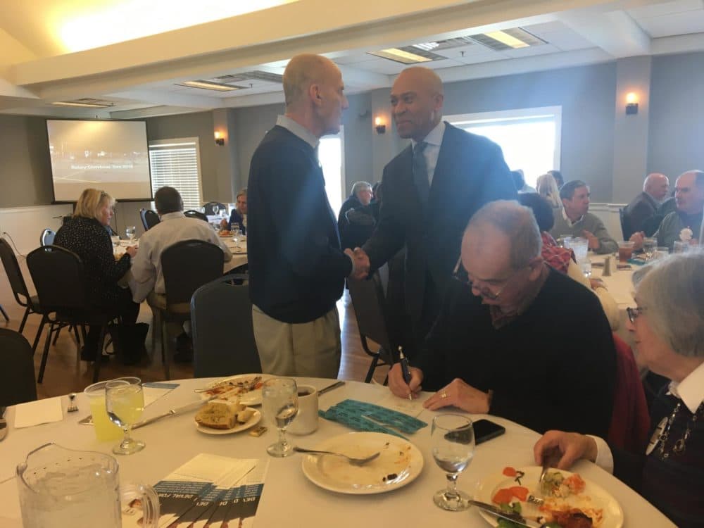 Former Massachusetts Governor Deval Patrick greets members of the audience before speaking to the Portsmouth Rotary Club. (Nancy Eve Cohen/NEPR)