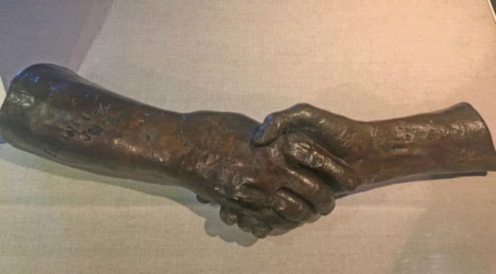 A bronze version of the sculpture of Elizabeth Cady Stanton (left) and Susan B. Anthony's hands by Mary 'Meb' Culbertson. (Courtesy Michael Rodriguez/Women's Rights National Historic Park via Historical Details by Ann Gordon of Rutgers University)