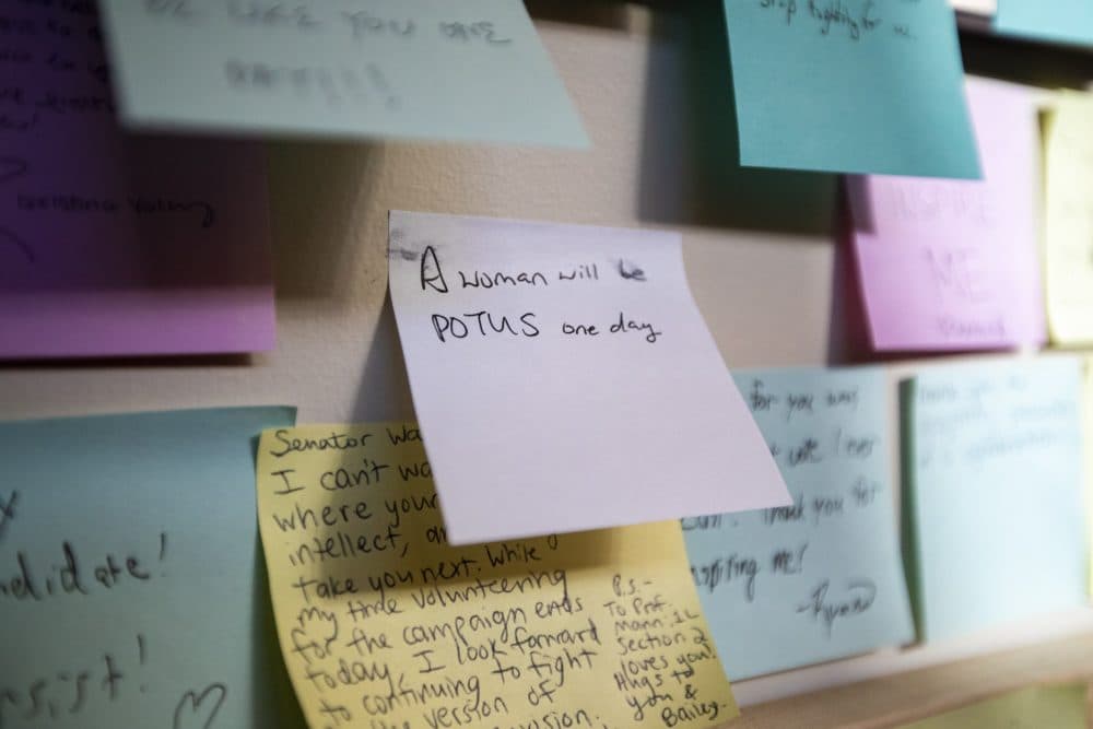 Sticky notes are placed around the portrait of Elizabeth Warren in Wasserstein Hall at Harvard Law School Thanking her for running for president. (Jesse Costa/WBUR)